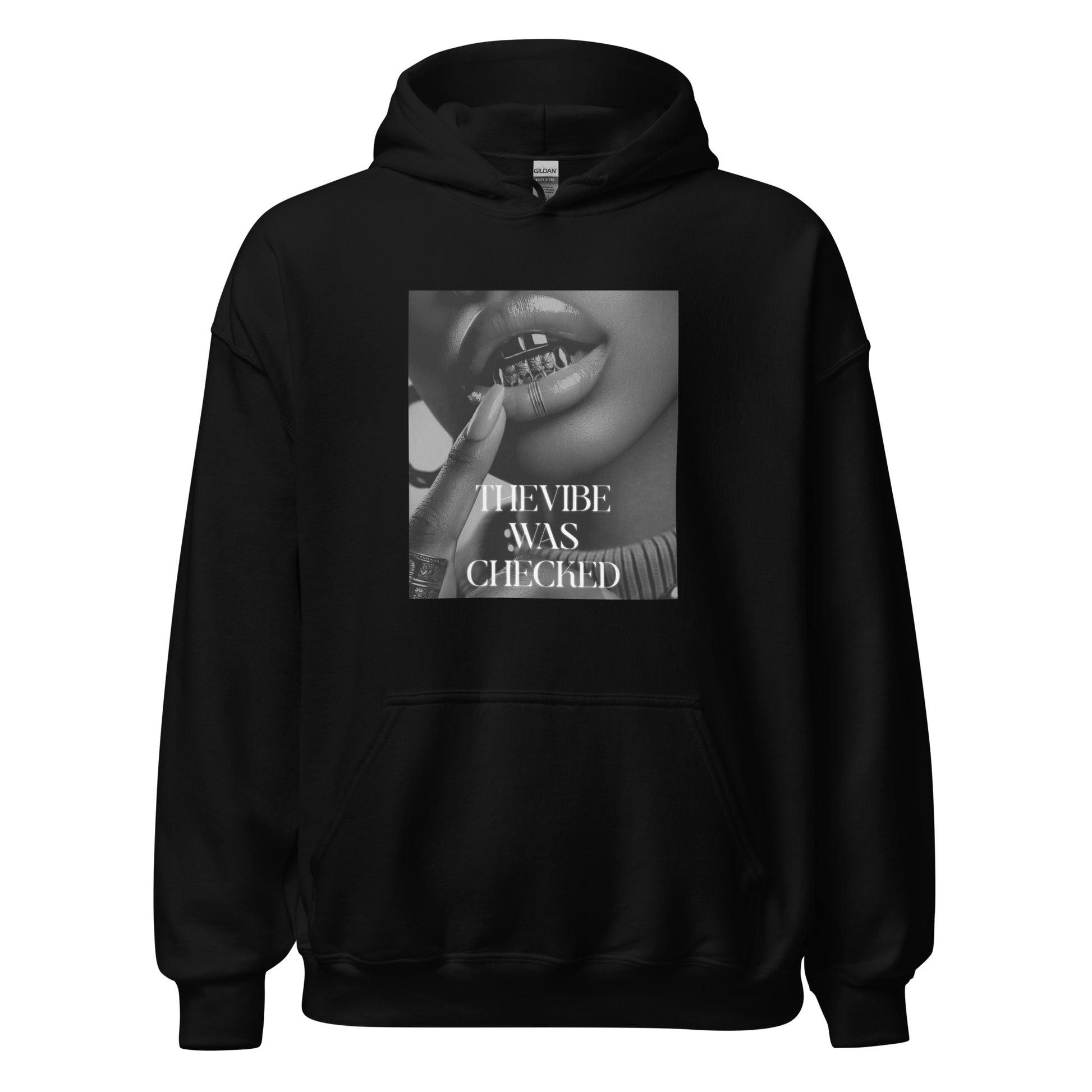 Black hoodie featuring a bold black-and-white print of lips with a grill and the phrase "THE VIBE WAS CHECKED.