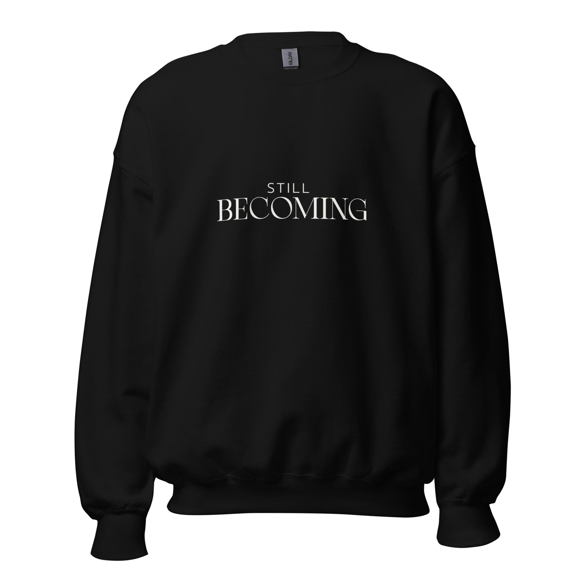 Black crewneck sweatshirt with Still Becoming graphic by Paper Coconuts, soft cotton blend for relaxed everyday wear
