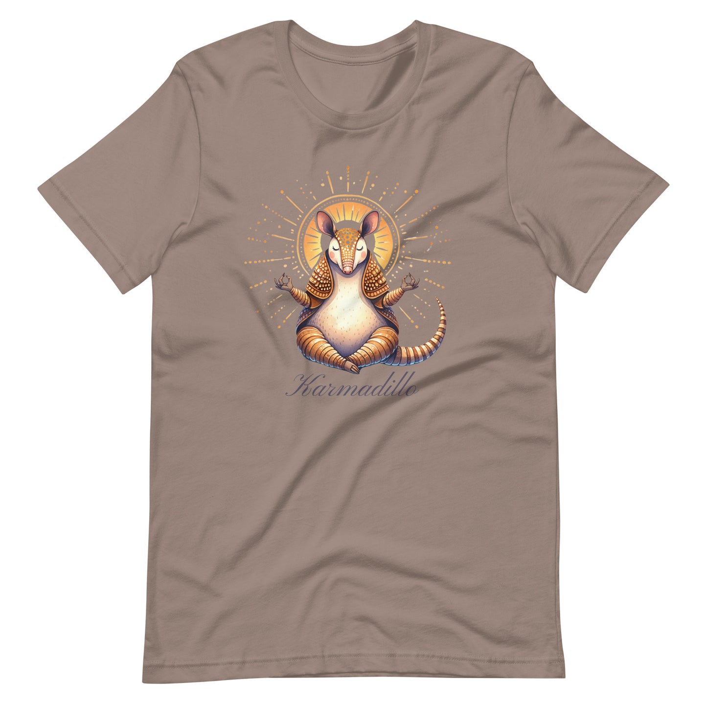 Beige t-shirt featuring a "Karmadillo" design with a meditating armadillo radiating peaceful energy. 